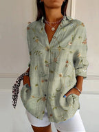 dames blouse lange mouw met grafische print in groen blad