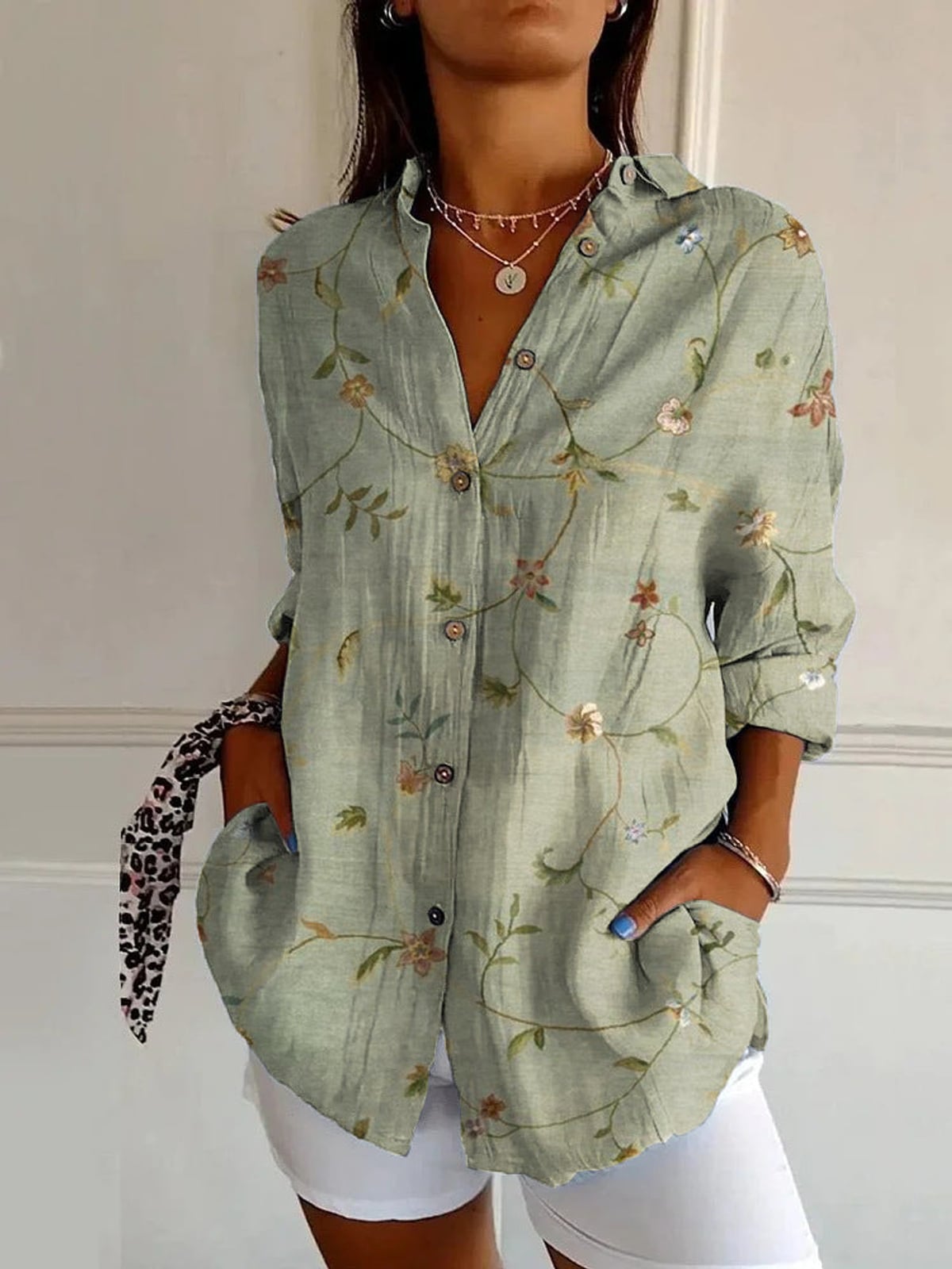 dames blouse lange mouw met grafische print in groen blad