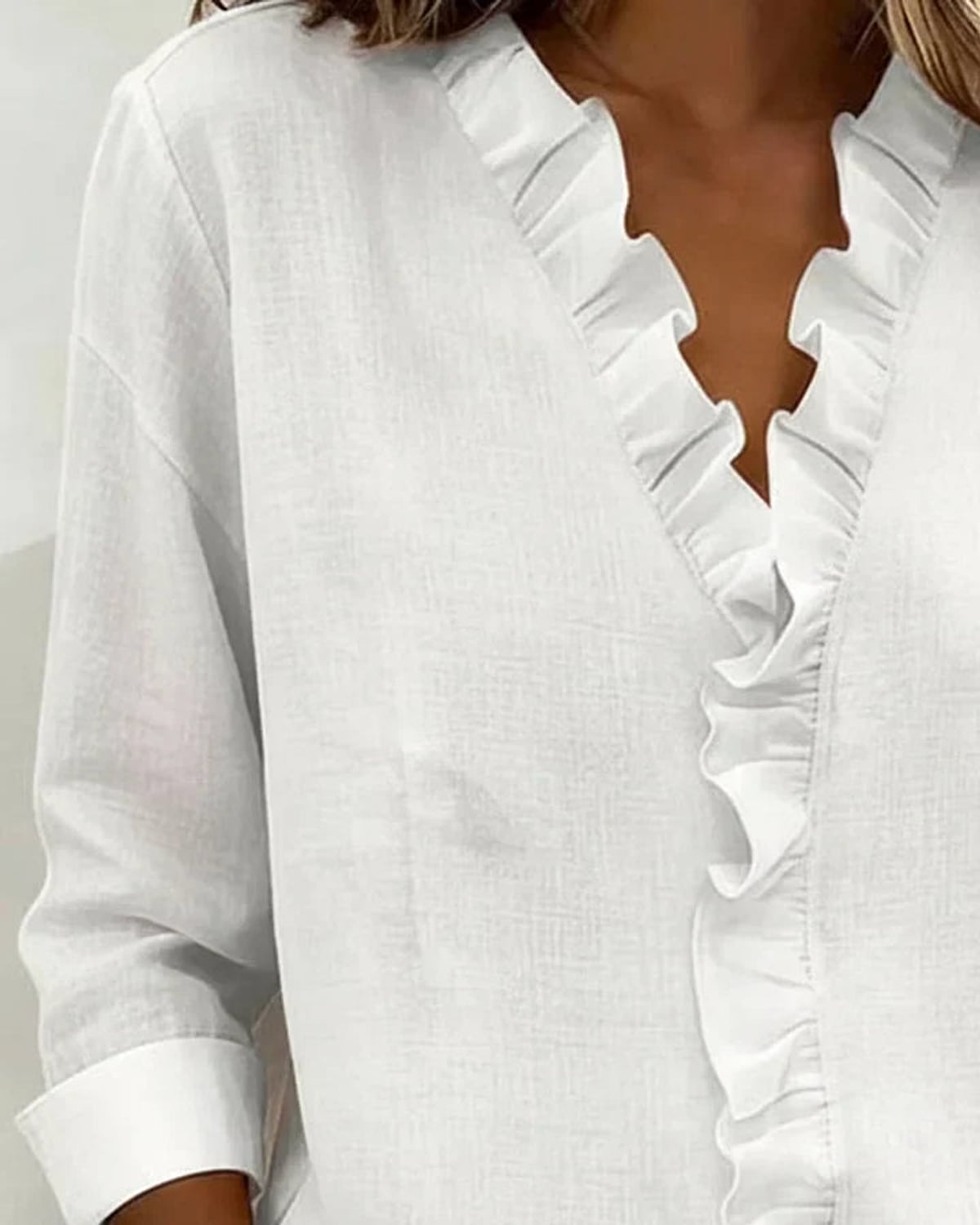 dames blouse lange mouw met ruches in wit