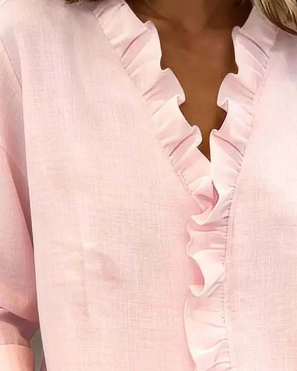 dames blouse lange mouw met ruches in roze