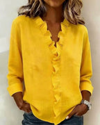 dames blouse lange mouw met ruches in geel