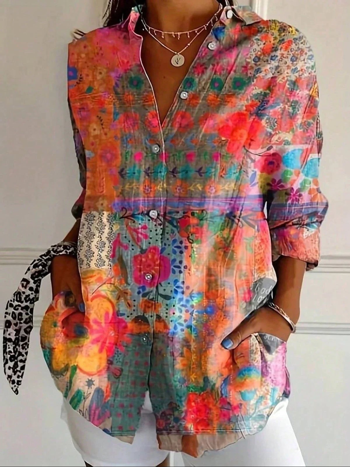 dames blouse met lange mouw en bloemenprint in oranje