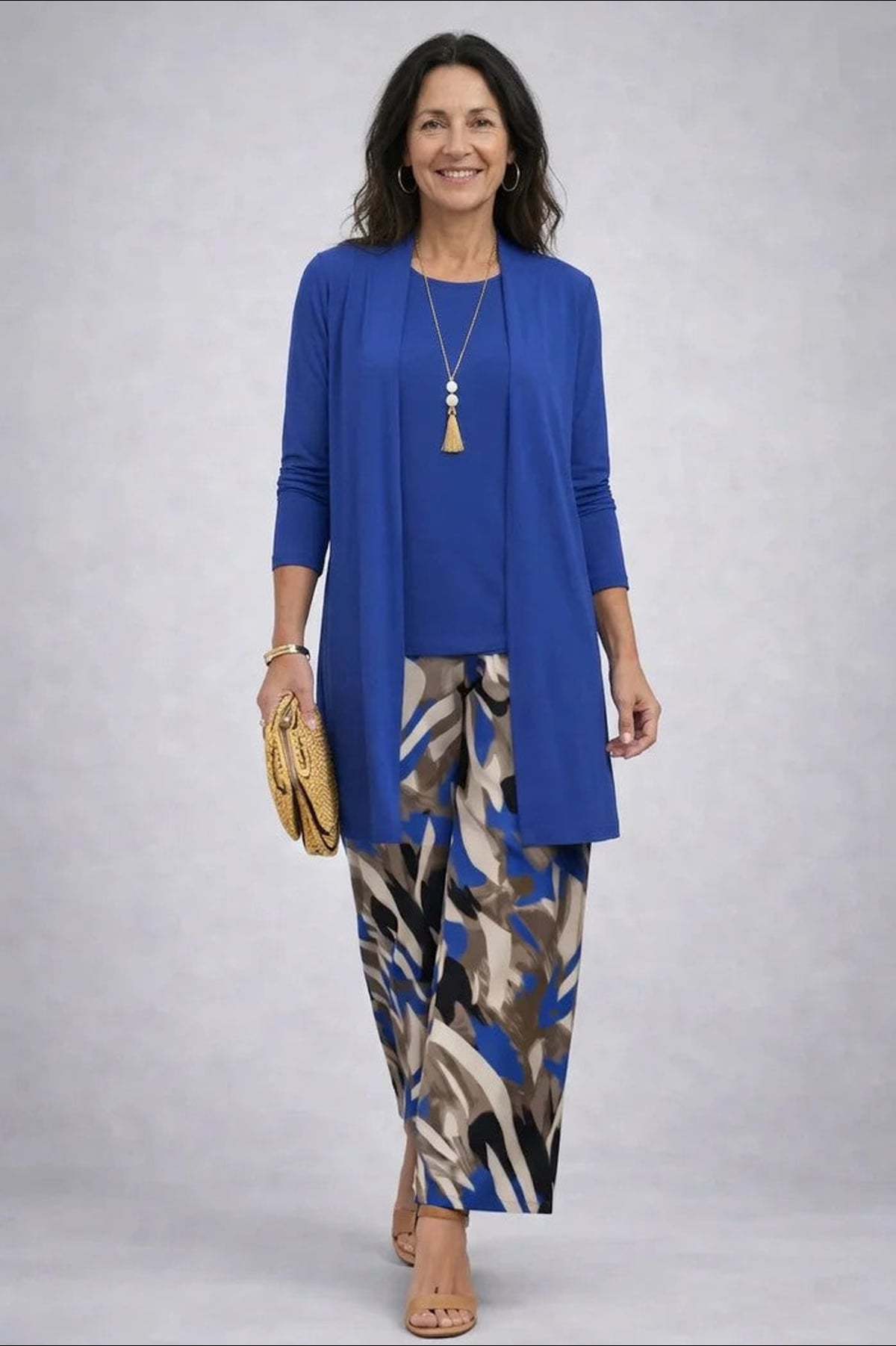 dames driedelig broekpak met open vest in blauw