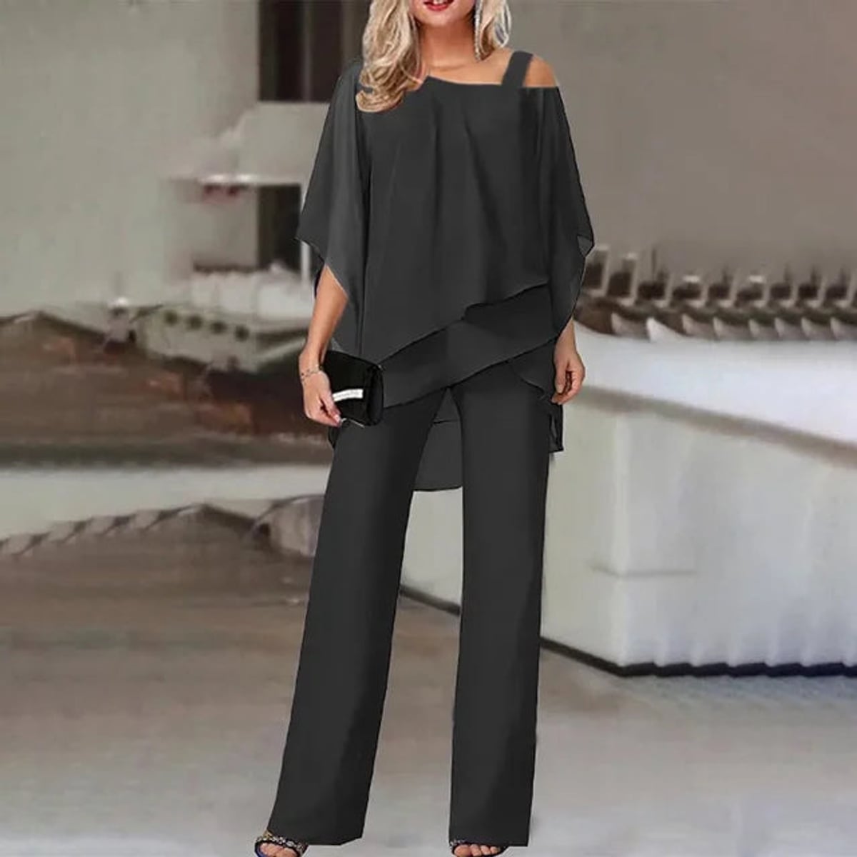 dames elegante jumpsuit met open schouder in zwart