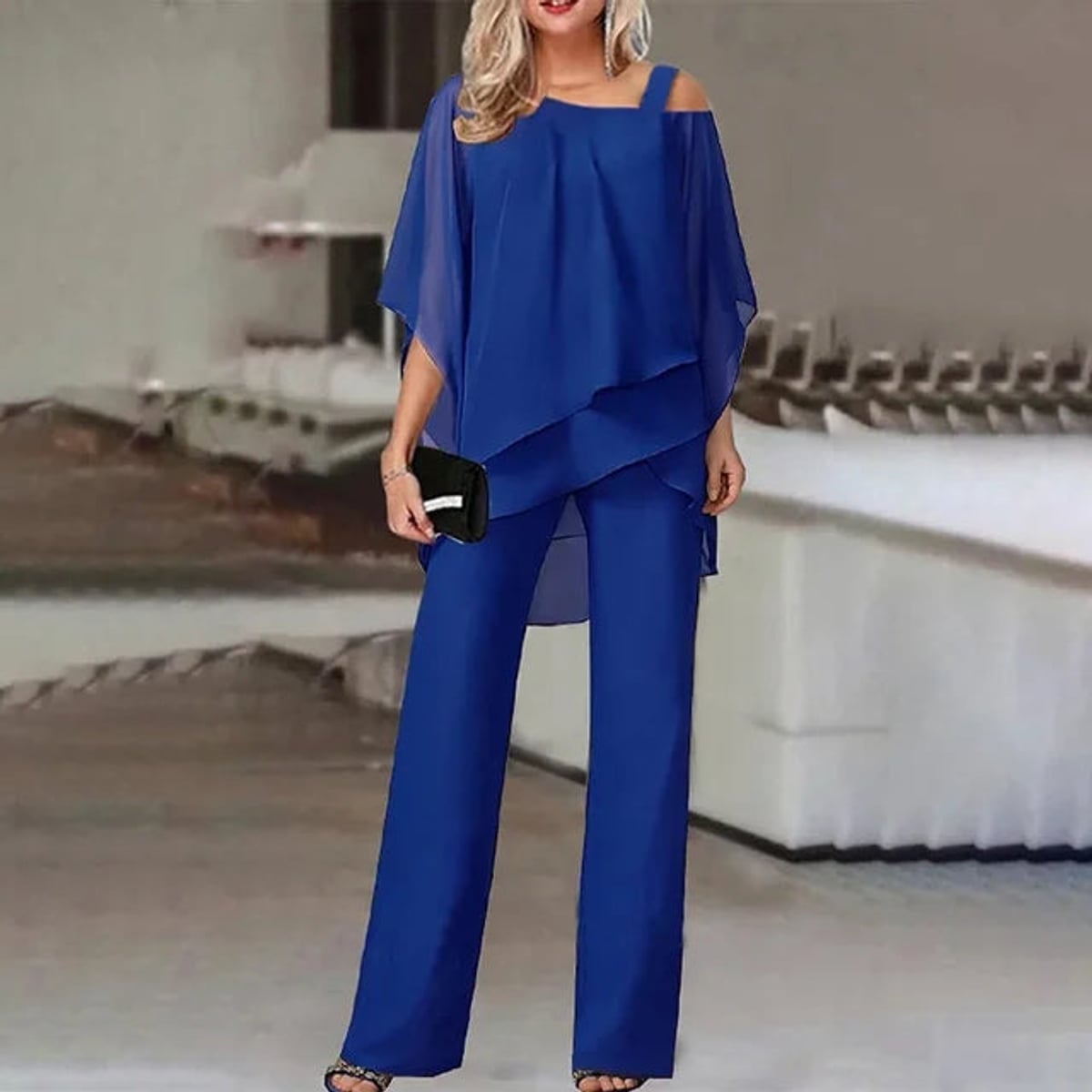 dames elegante jumpsuit met open schouder in blauw