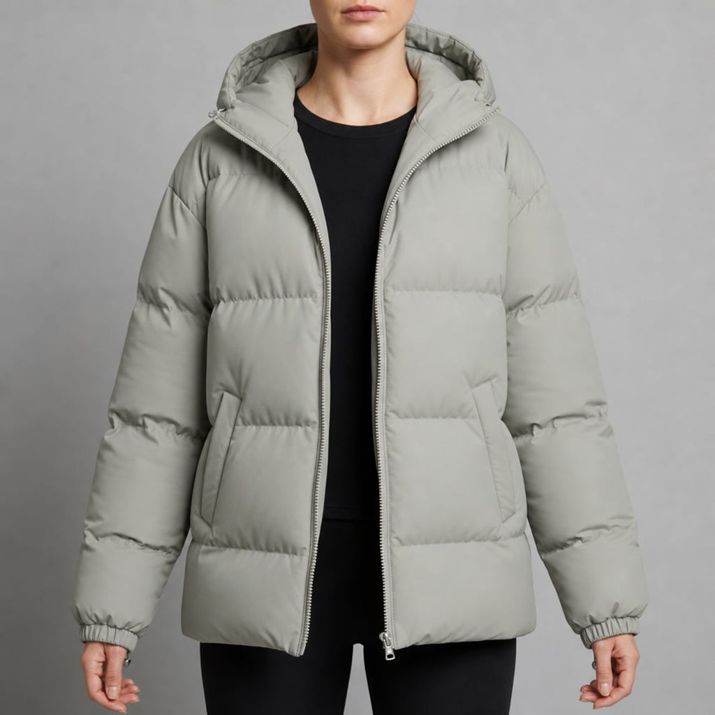 dames gewatteerde puffer jas met capuchon in lichtgrijs