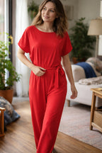 dames jumpsuit korte mouw met strikceintuur in rood