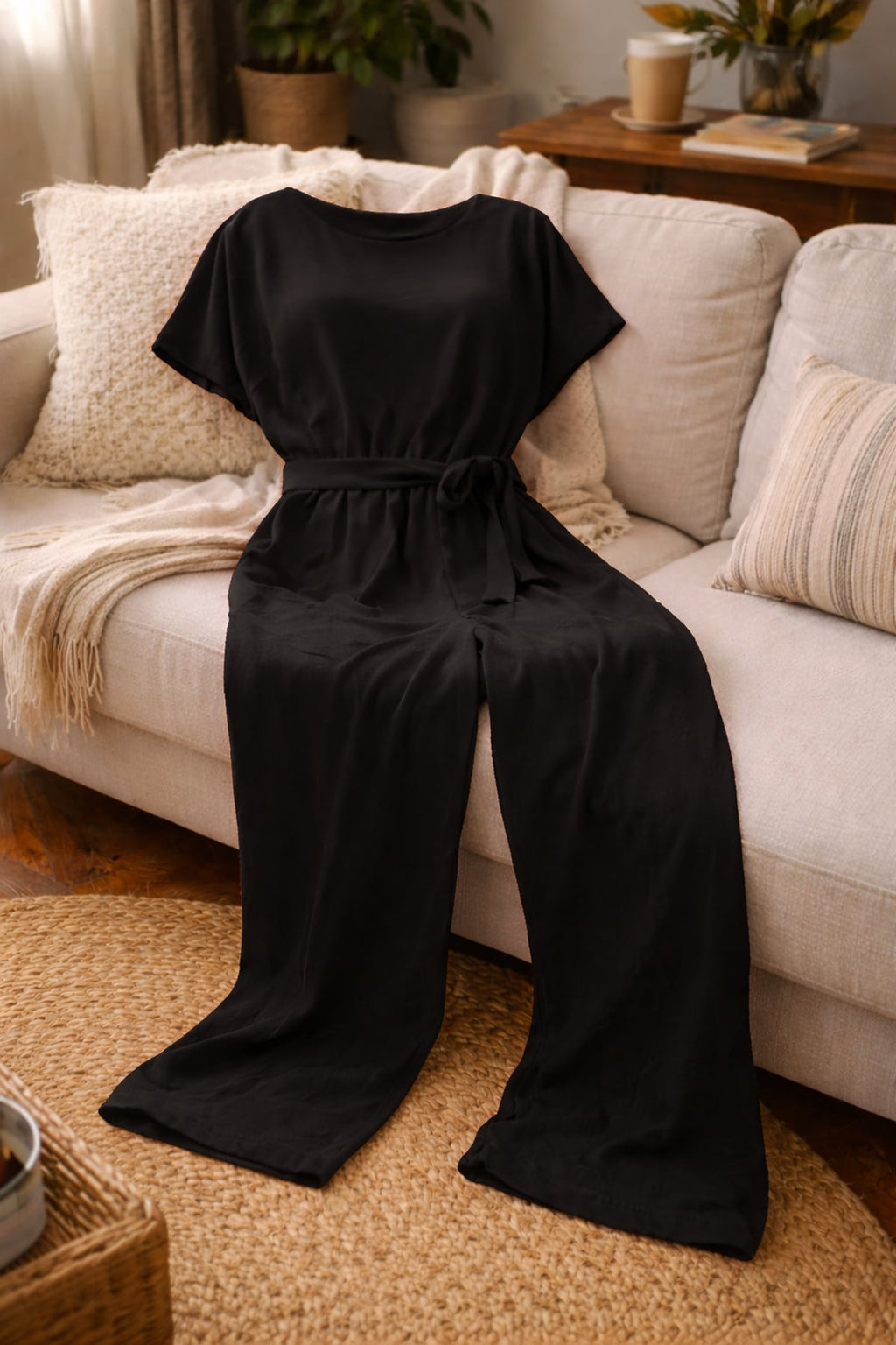 dames jumpsuit korte mouw met strikceintuur in zwart
