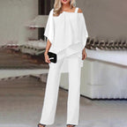 dames jumpsuit met cold shoulder en wijde pijp in wit