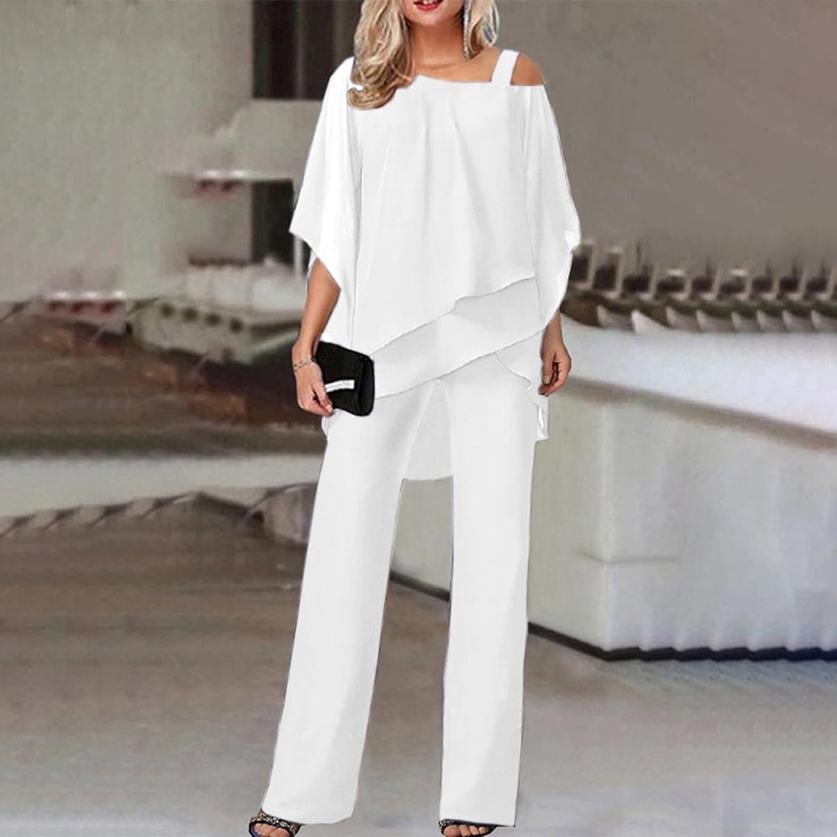 dames jumpsuit met cold shoulder en wijde pijp in wit