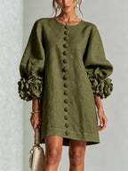 dames jurk lange mouwen met bloemdetails in groen