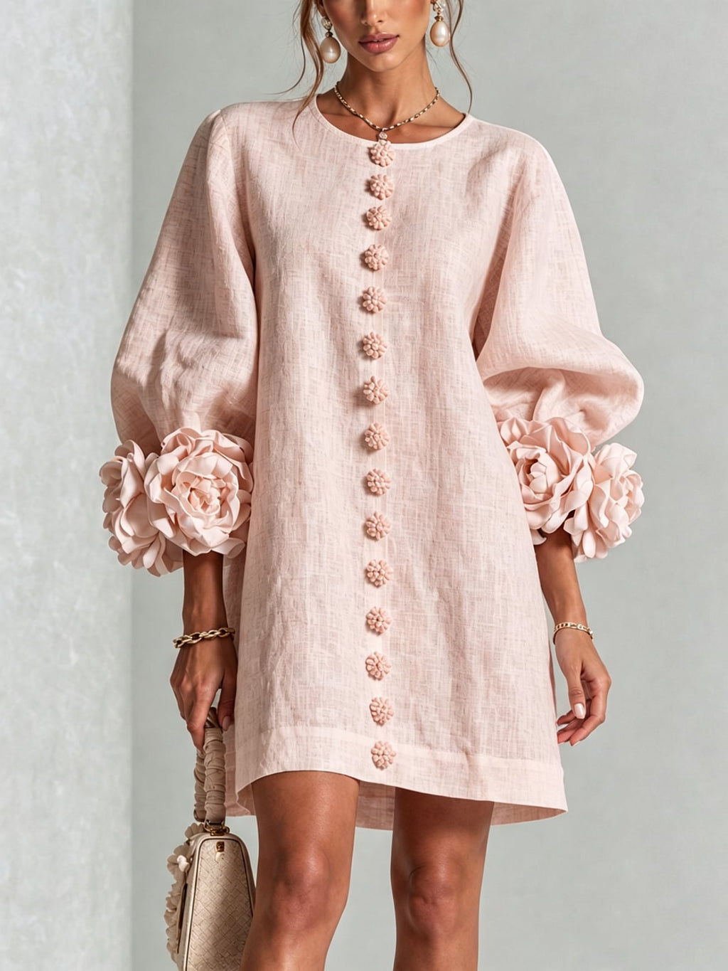dames jurk lange mouwen met bloemdetails in roze