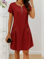 dames jurk met korte mouwen en zijzakken in rood