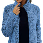 dames korte jas met staande kraag en rits in blauw