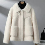 dames korte jas met teddy structuur in beige