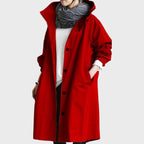 dames lange jas met capuchon en knoopsluiting in rood