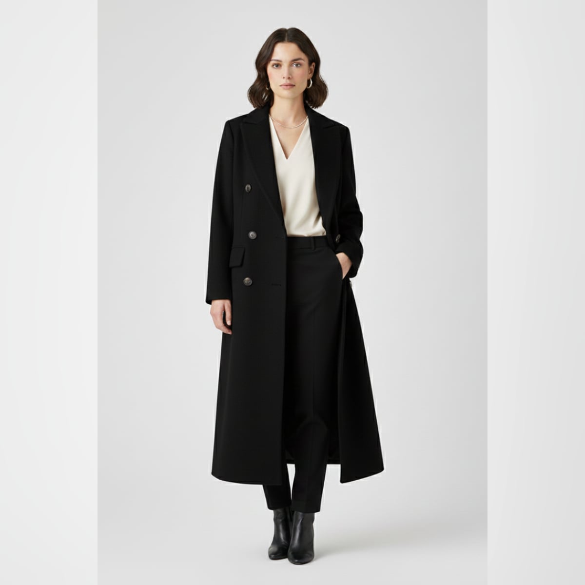 dames lange jas met revers en knoopsluiting in zwart