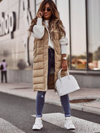 dames lange pufferjas met capuchon in beige