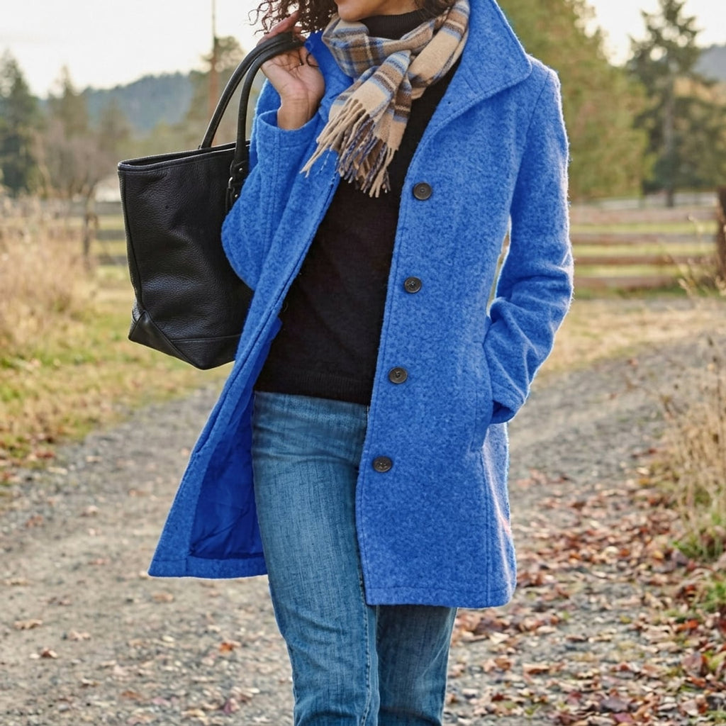 dames lange winterjas met knoopsluiting in blauw