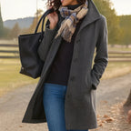 dames lange winterjas met knoopsluiting in grijs