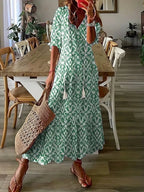 dames lange zomerjurk met v-hals en print in groen