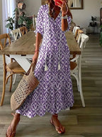 dames lange zomerjurk met v-hals en print in mauve
