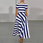 dames maxi jurk met boothals en korte mouwen in blauw