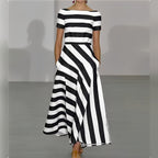 dames maxi jurk met boothals en korte mouwen in zwart
