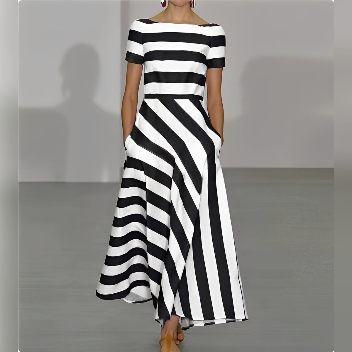 dames maxi jurk met boothals en korte mouwen in zwart