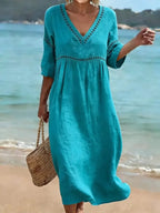 dames midi jurk met v-hals in blauw
