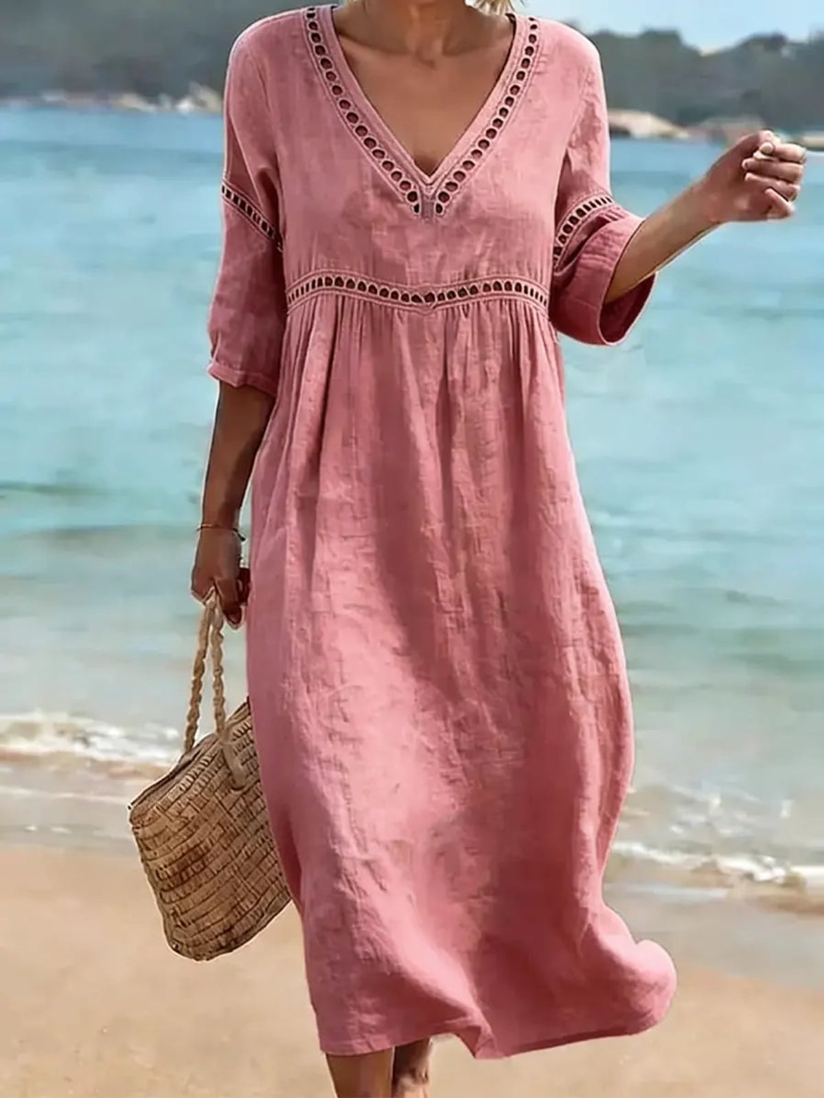 dames midi jurk met v-hals in roze