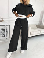 dames oversized hoodie set met wide leg broek in zwart