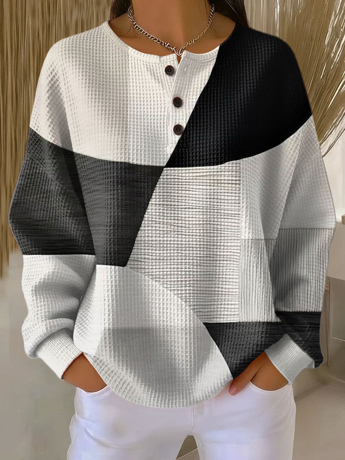 dames oversized sweater met knoopdetail in art