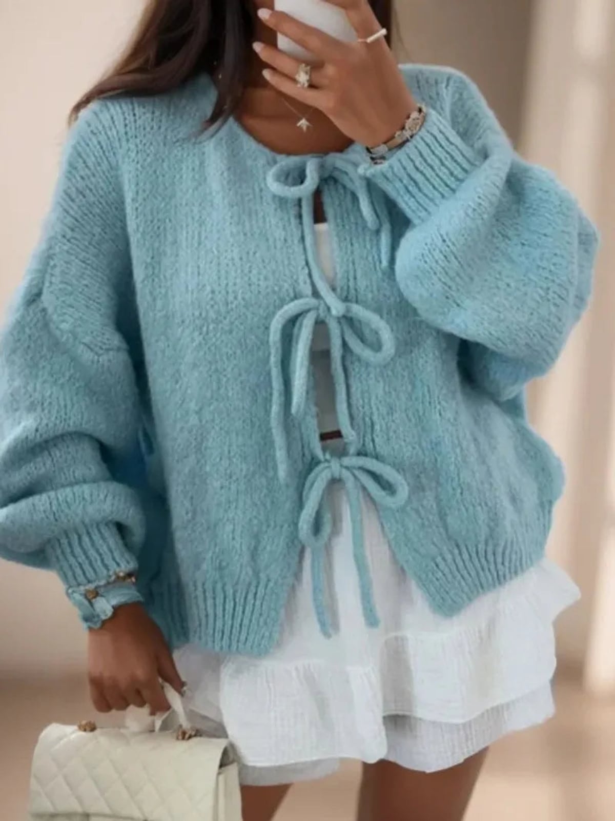 dames oversized vest met striksluitingen in blauw