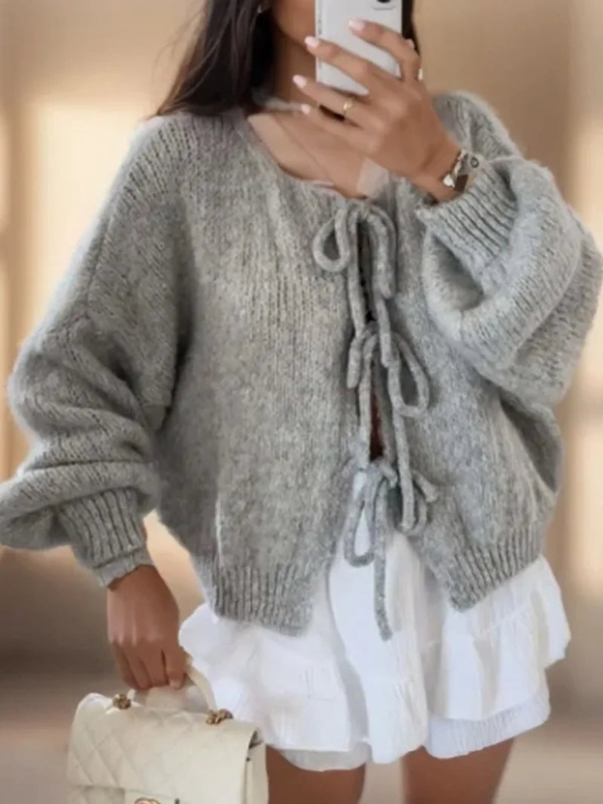 dames oversized vest met striksluitingen in grijs