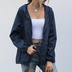 dames regenjas met capuchon en rits in marineblauw