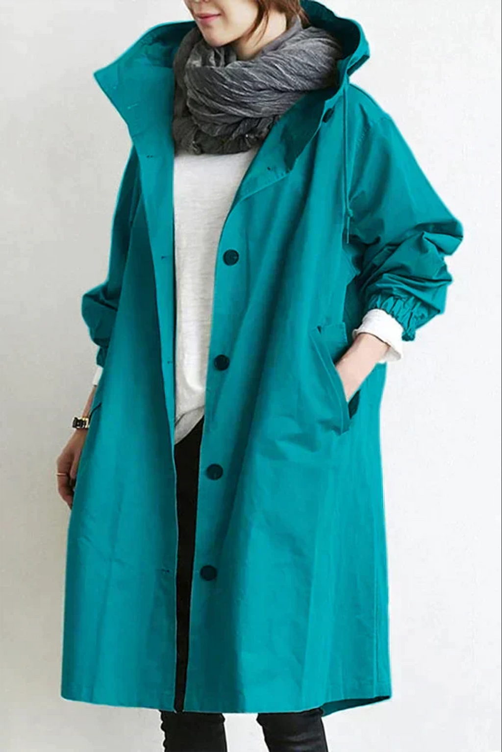 dames regenjas met oversized capuchon blauwgroen 
