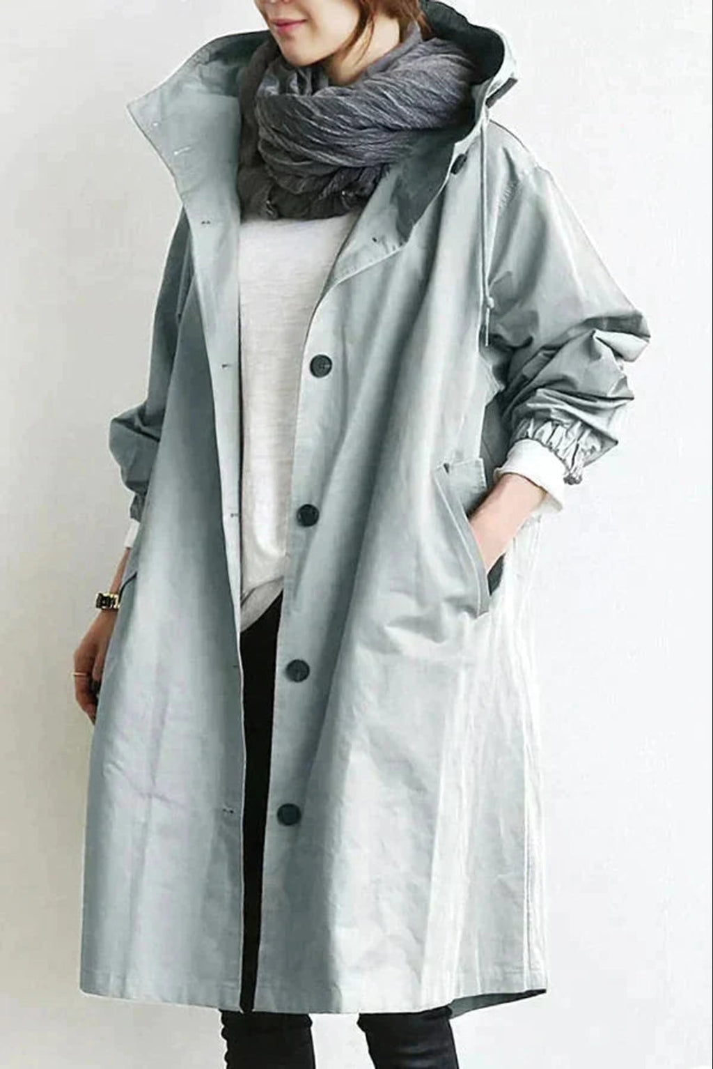 dames regenjas met oversized capuchon  lichtblauw