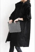 dames regenjas met oversized capuchon