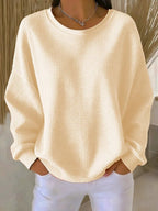 dames relaxed trui oversized met ronde hals in abrikoos
