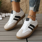 dames retro sneakers met vetersluiting in zwart & wit