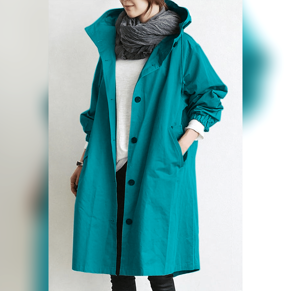 dames trenchcoat met capuchon in turquoise