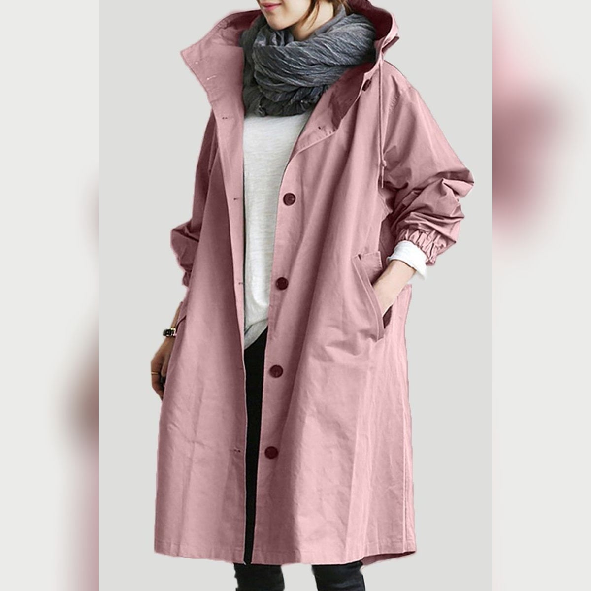 dames trenchcoat met capuchon in roze