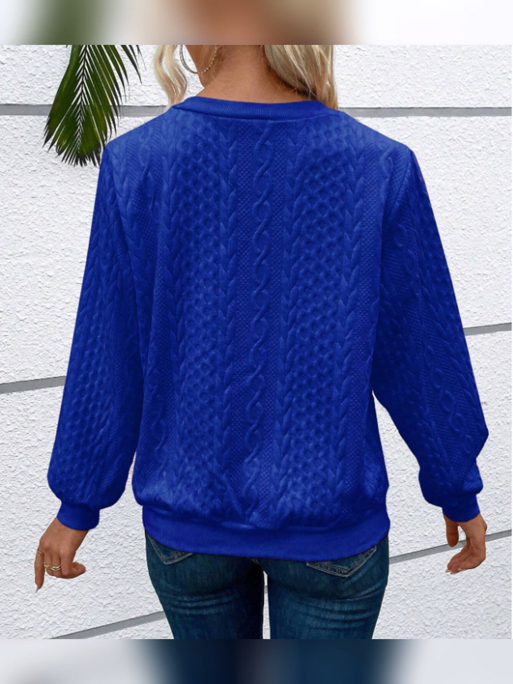 dames trui met rits en kabelstructuur in blauw
