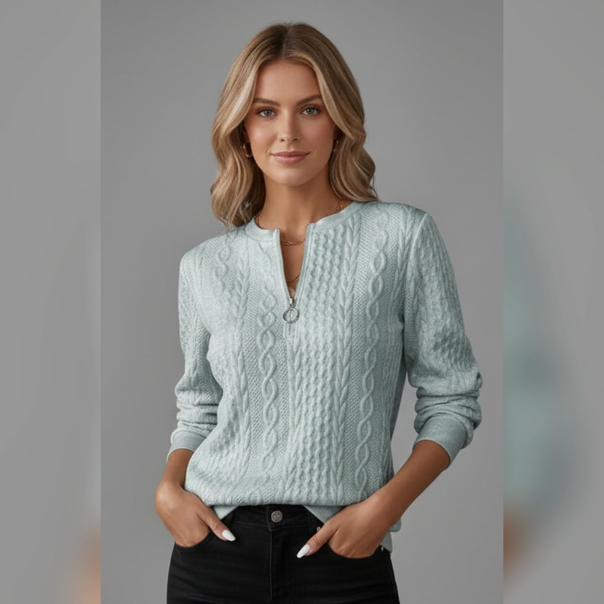 dames trui met ritssluitng en staande kraag in grijs