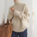 dames trui oversized met rolkraag in abrikoos
