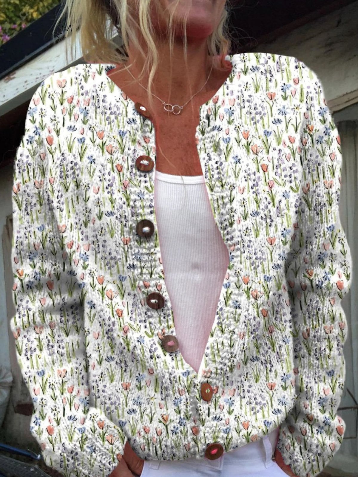 dames vest met bloemenprint en knoopsluiting in wit