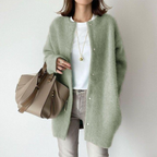 dames vest met lange mouw en ronde hals in groen