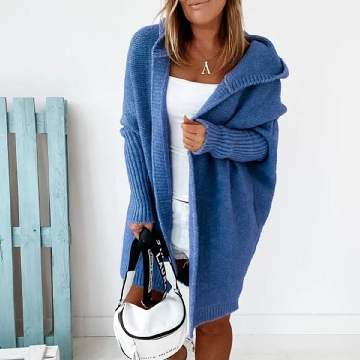dames vest oversized met capuchon in blauw
