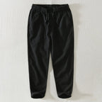 heren relaxed fit broek met toelopende pijp in zwart